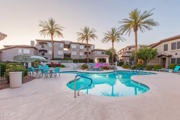 a view of pool with outdoor seating