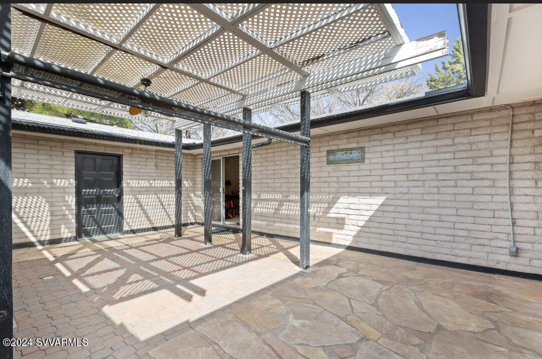 3600 East Rimrock Drive Rimrock, AZ 86335 - Photo 5 of 57 a view of a patio with a table and chairs and wooden fence