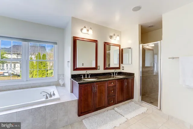 a view of a livingroom with furniture and a flat screen tv