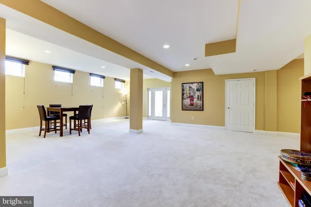a view of a swimming pool with a lounge chairs