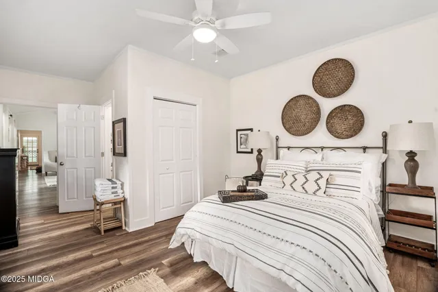a bedroom with a bed and closet