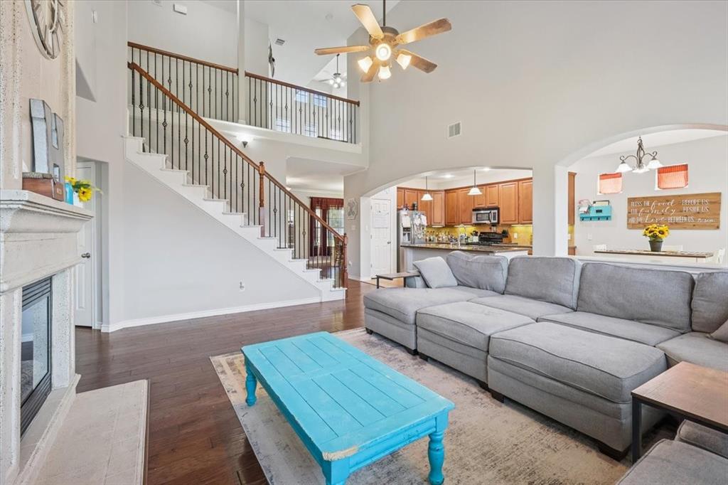 868 Valley Ridge Road Burleson, TX 76028 - Photo 18 of 39 a living room with furniture and a table