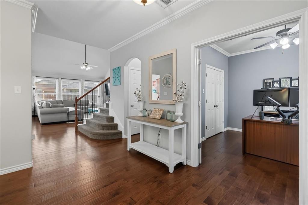 868 Valley Ridge Road Burleson, TX 76028 - Photo 3 of 39 a view of living room with furniture and wooden floor