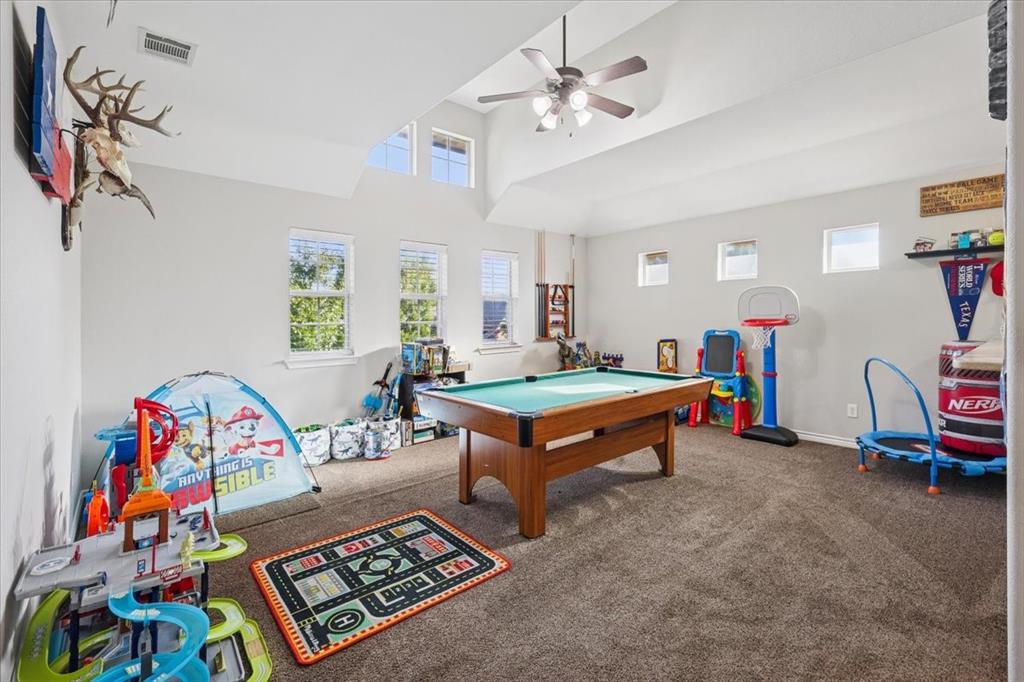 868 Valley Ridge Road Burleson, TX 76028 - Photo 31 of 39 a living room with furniture and a table
