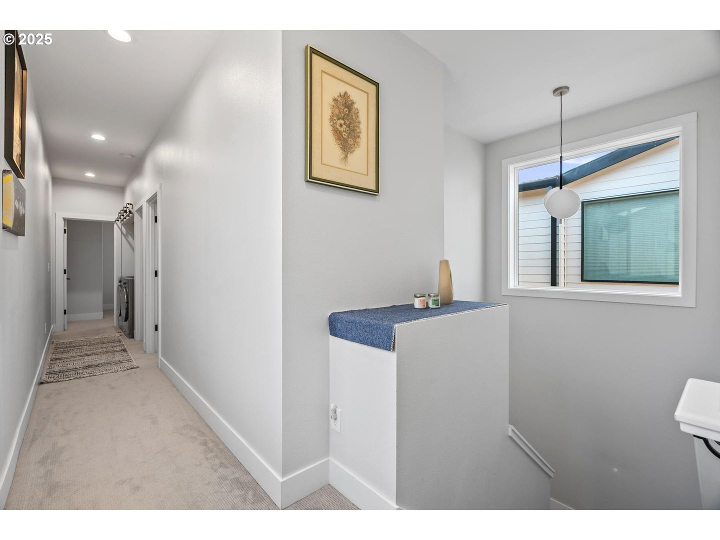 5424 Southeast Knapp Street Portland, OR 97206 - Photo 15 of 35 a view of hallway with window and stairs