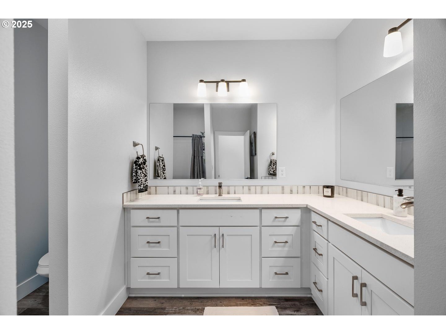 5424 Southeast Knapp Street Portland, OR 97206 - Photo 18 of 35 a bathroom with a sink and a mirror