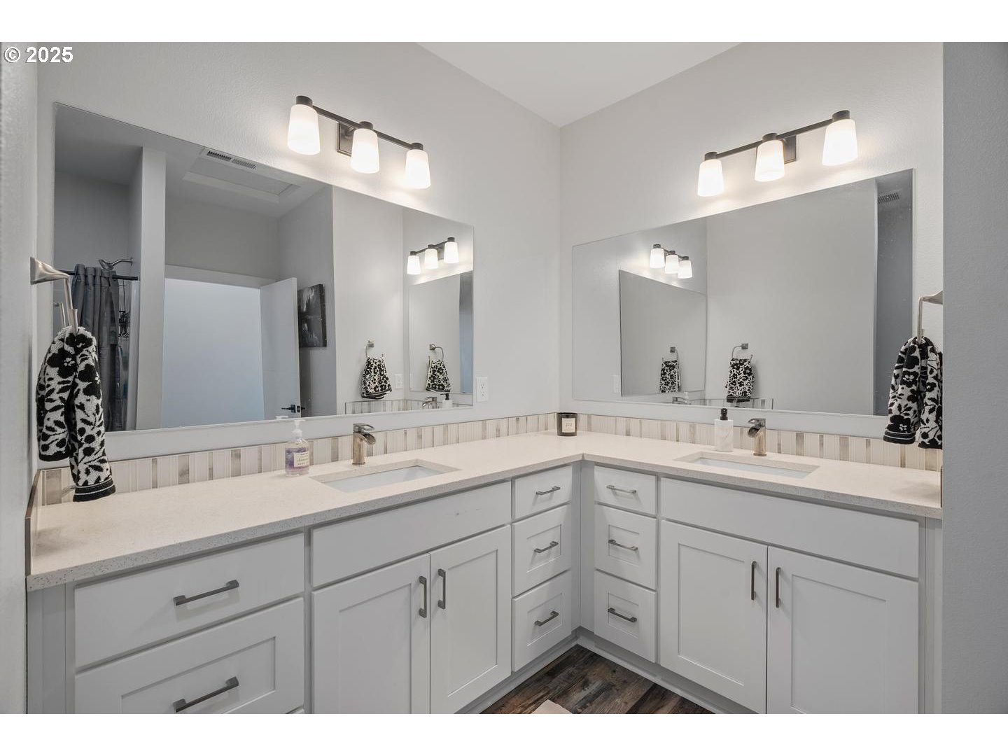 5424 Southeast Knapp Street Portland, OR 97206 - Photo 19 of 35 a bathroom with a sink double vanity and a mirror