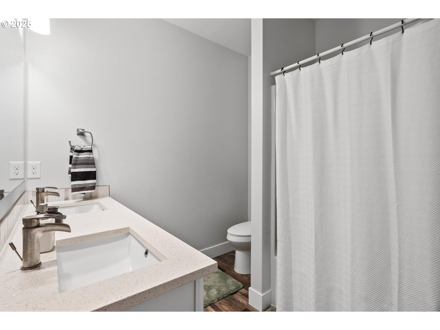 5424 Southeast Knapp Street Portland, OR 97206 - Photo 25 of 35 a bathroom with a sink and a mirror