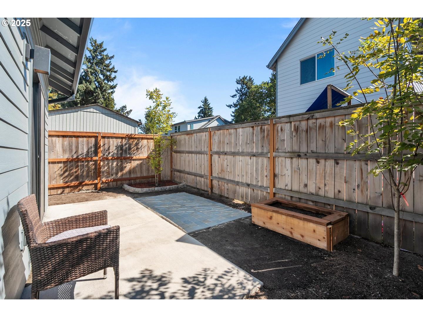 5424 Southeast Knapp Street Portland, OR 97206 - Photo 29 of 35 a view of a backyard with sitting area