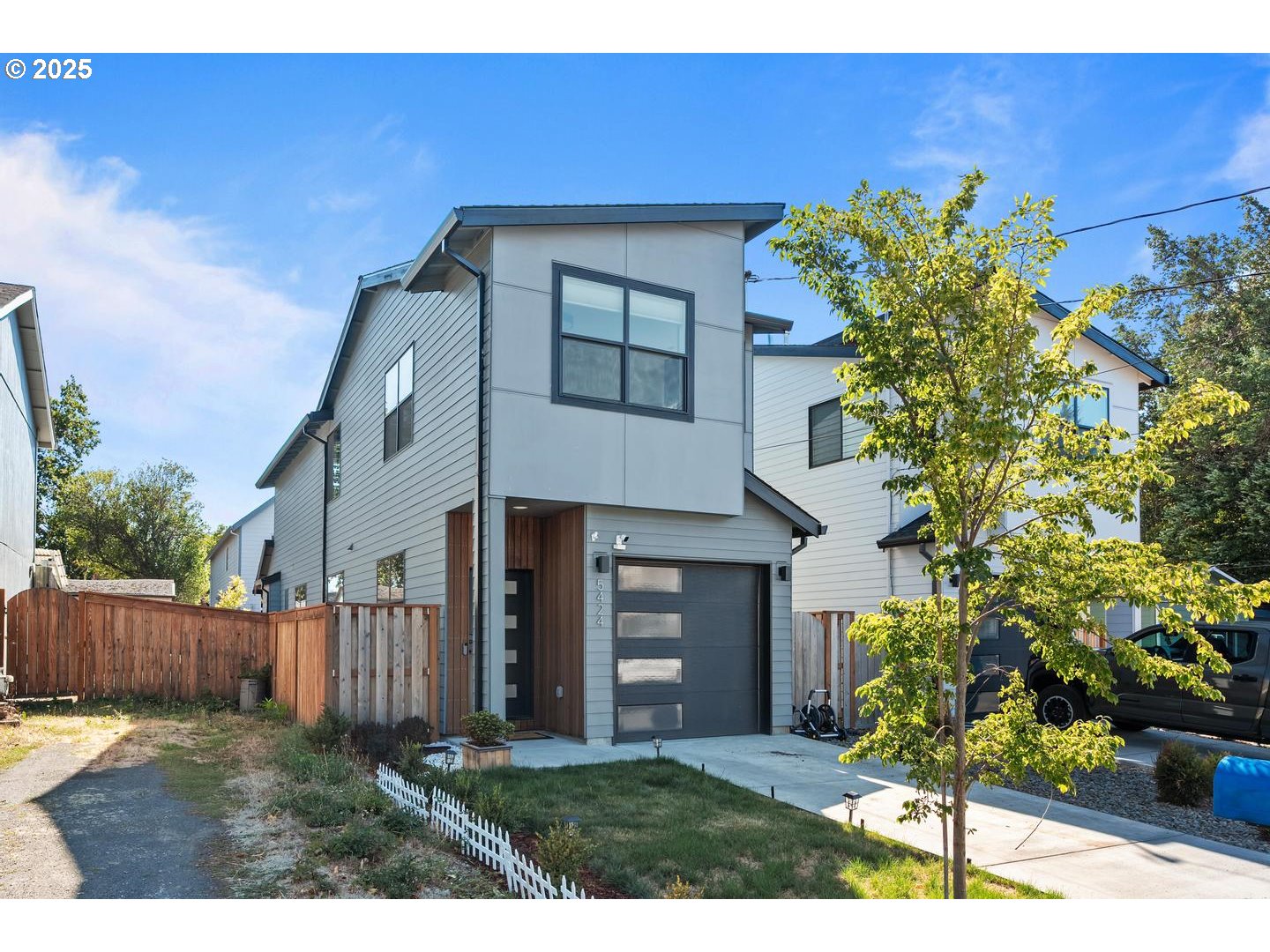 5424 Southeast Knapp Street Portland, OR 97206 - Photo 32 of 35 a view of a house with a yard