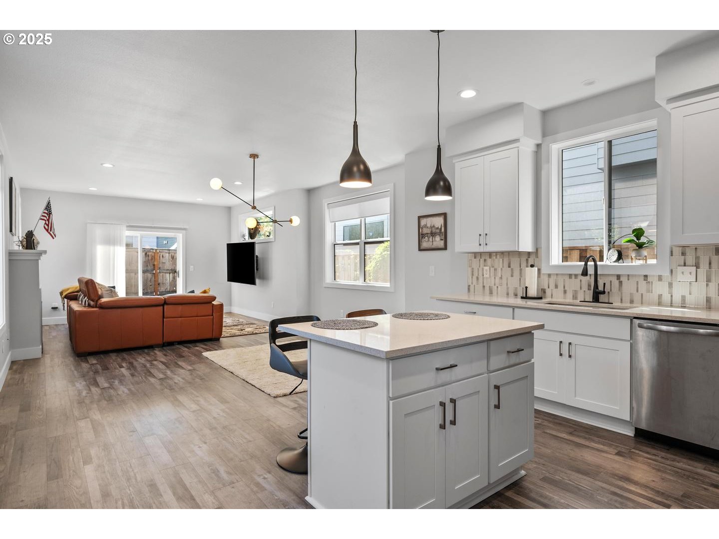 5424 Southeast Knapp Street Portland, OR 97206 - Photo 4 of 35 a kitchen with sink stove and wooden floor