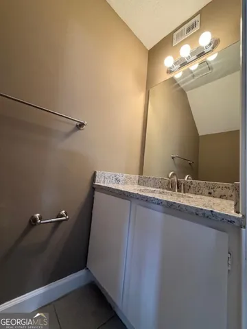 a view of a back yard of the house