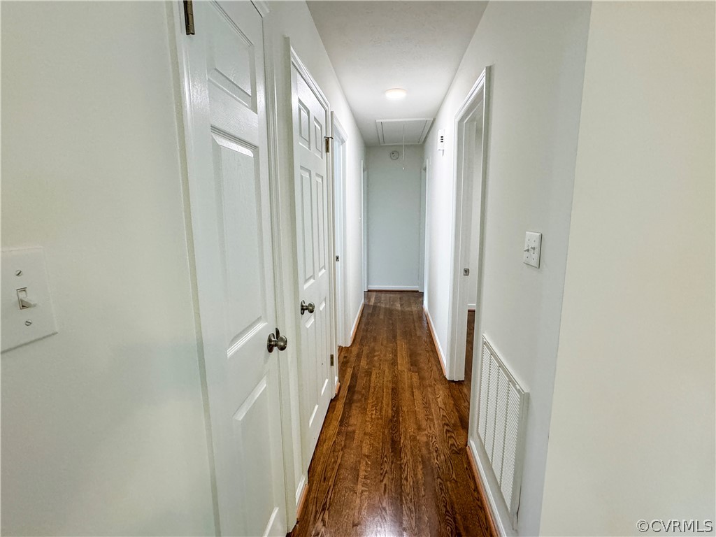 1787 Mc Cune Road Crewe, VA 23930 - Photo 20 of 41 a view of a hallway with wooden floor and staircase