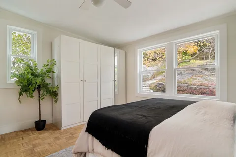 a vase of flowers sitting on a table in a room