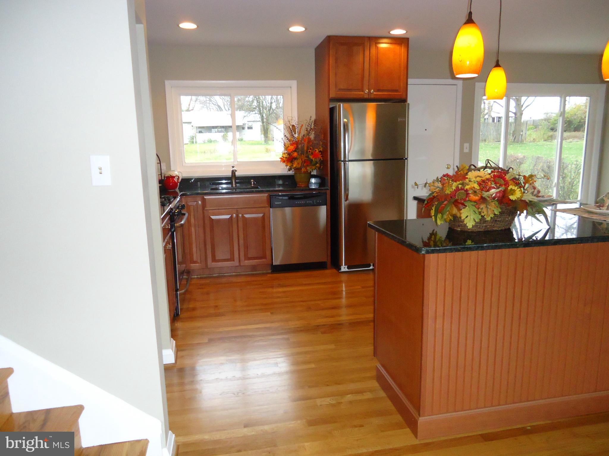 3614 Bellmore Road Baltimore, MD 21244 - Photo 4 of 20 a kitchen with stainless steel appliances a refrigerator and a stove