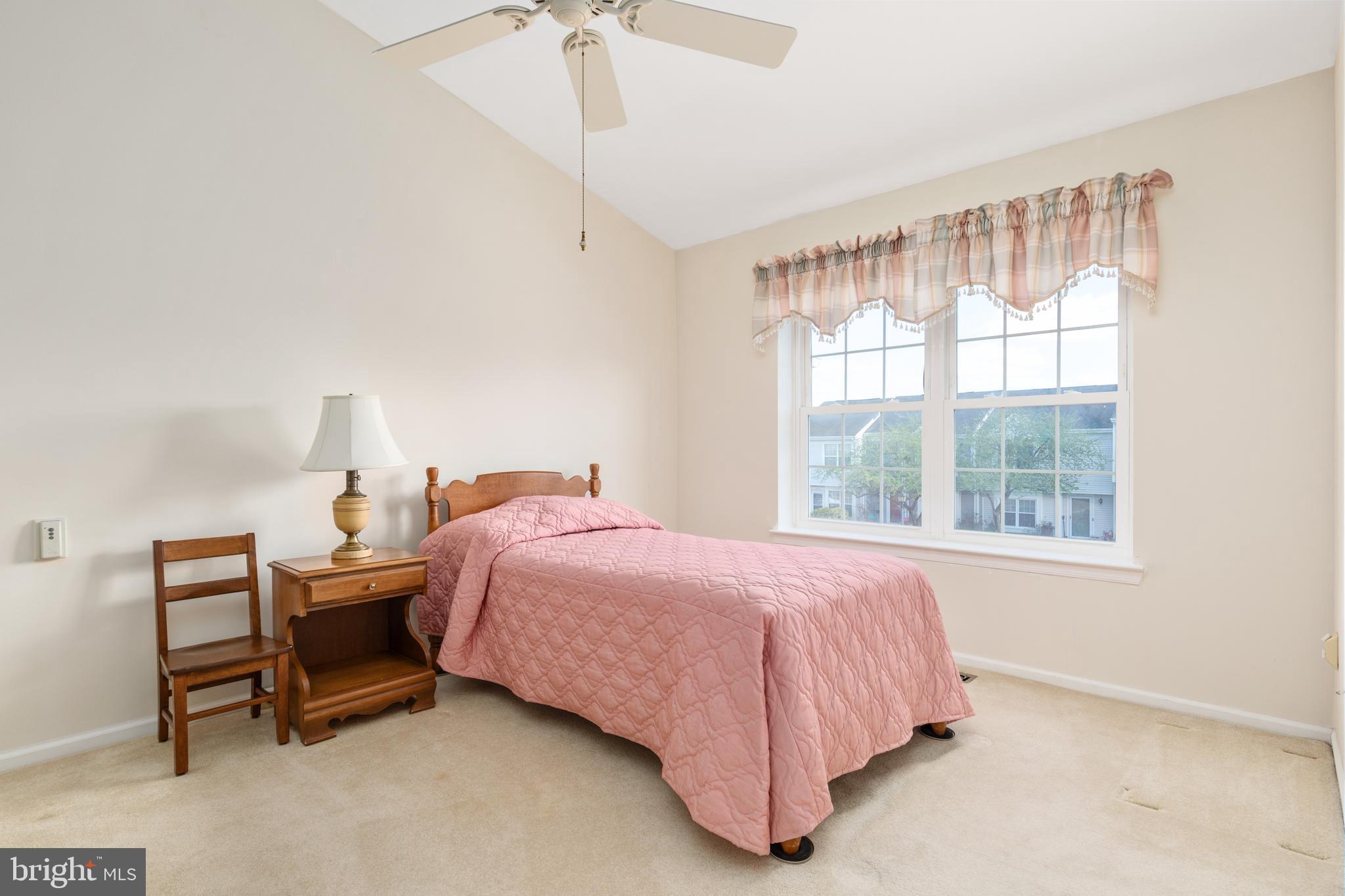 46712 Fielding Terrace Sterling, VA 20164 - Photo 16 of 22 a bedroom with a bed and a window