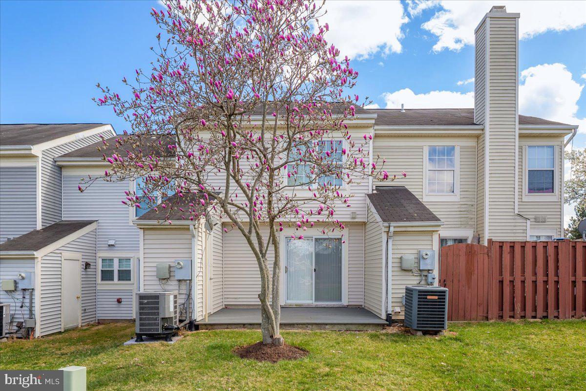 46712 Fielding Terrace Sterling, VA 20164 - Photo 21 of 22 a front view of house with yard