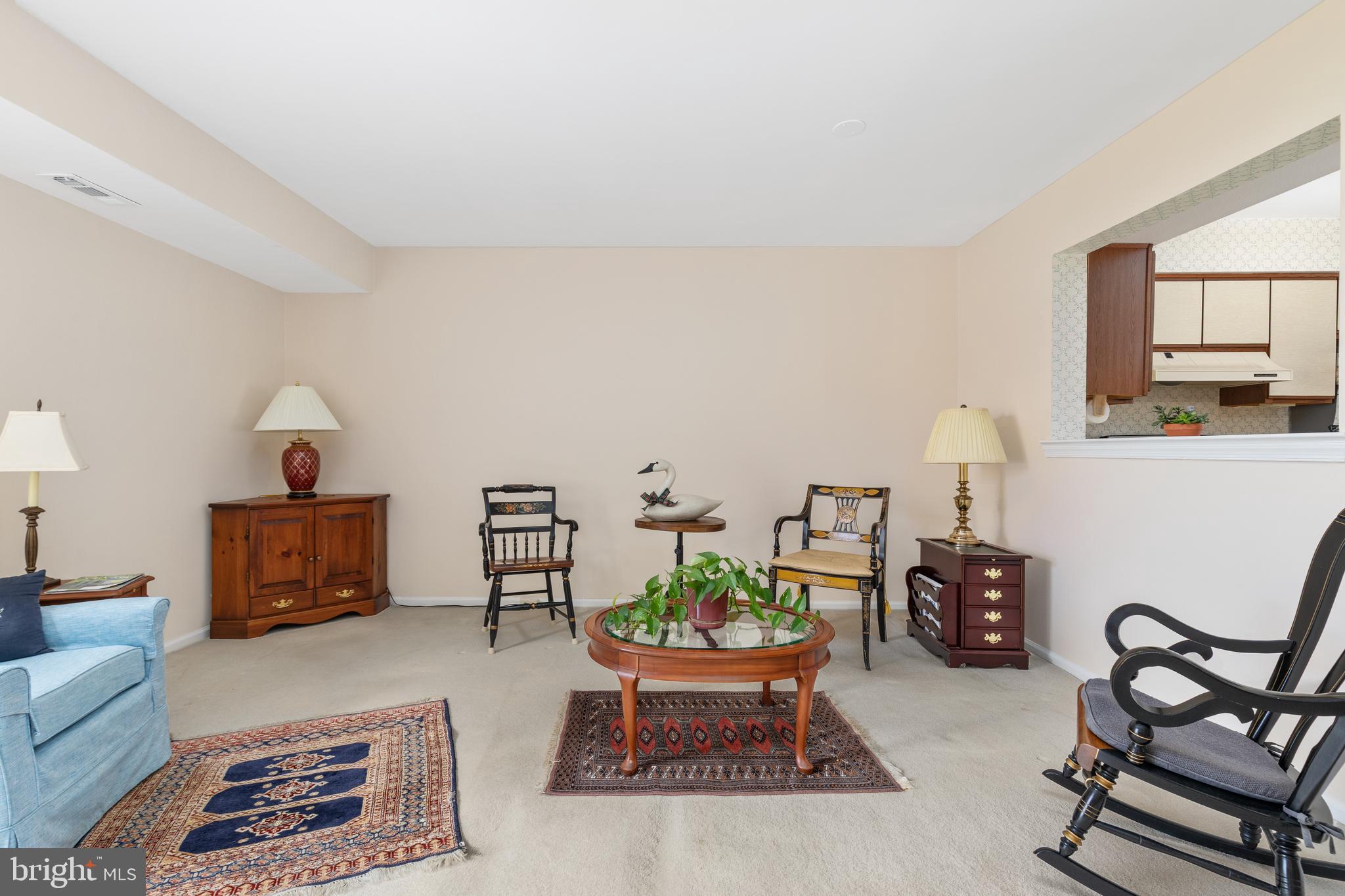46712 Fielding Terrace Sterling, VA 20164 - Photo 9 of 22 a living room with furniture and a window