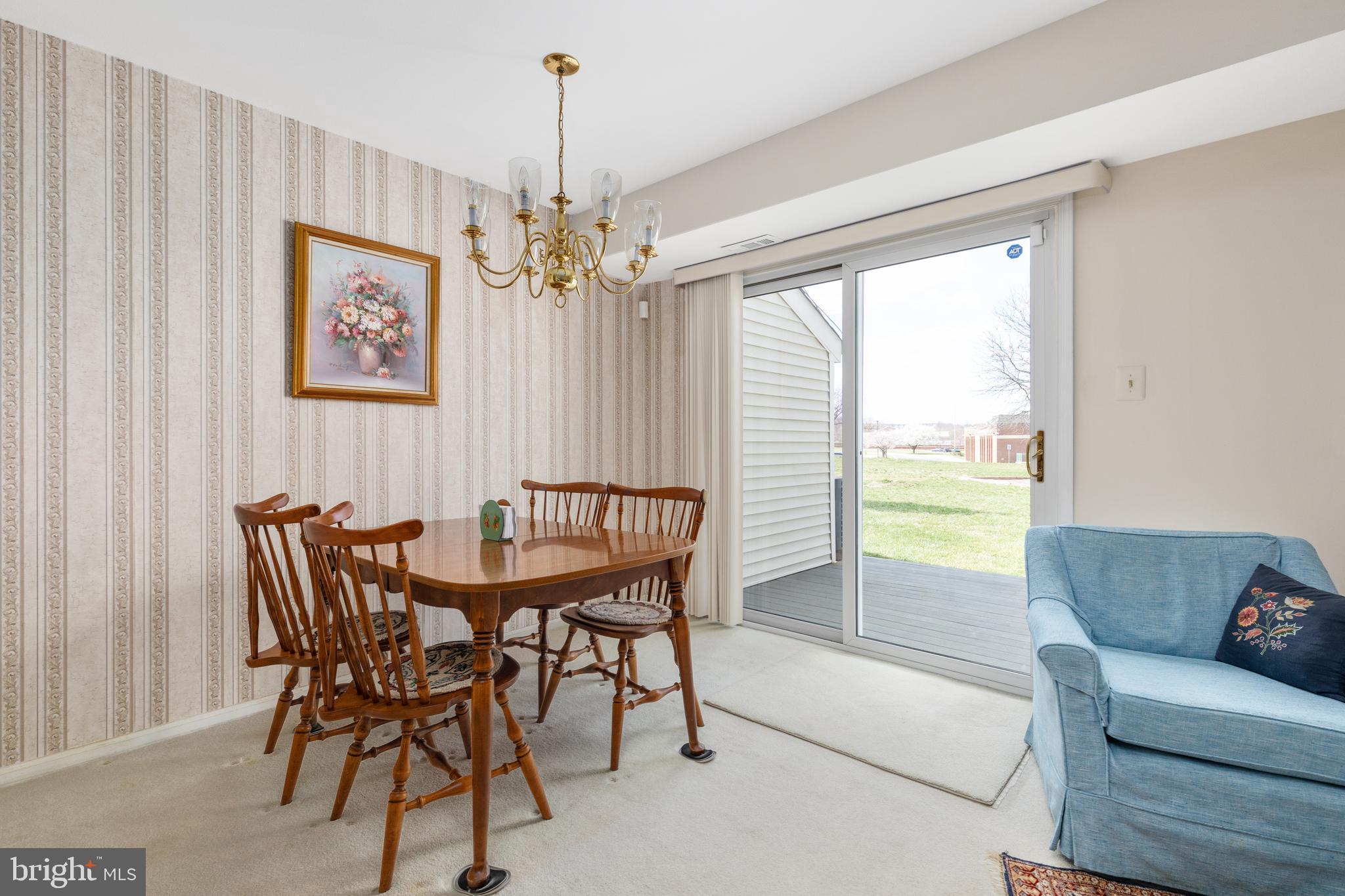 46712 Fielding Terrace Sterling, VA 20164 - Photo 10 of 22 a view of a dining room with furniture window and outside view