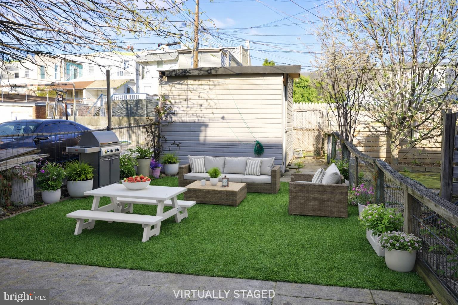 1013 North 10th Street Reading, PA 19604 - Photo 27 of 27 a view of a house with backyard sitting area and garden