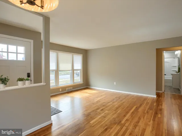 a view of an empty room and window