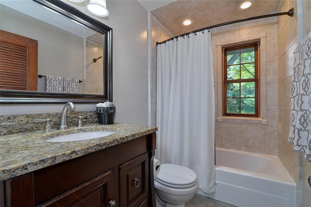 4 Locker Road Eighty Four, PA 15330 - Photo 16 of 25 a bathroom with a granite countertop sink toilet and shower