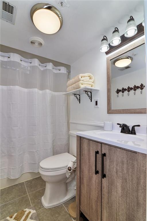 4 Locker Road Eighty Four, PA 15330 - Photo 20 of 25 a bathroom with a sink a toilet and a mirror