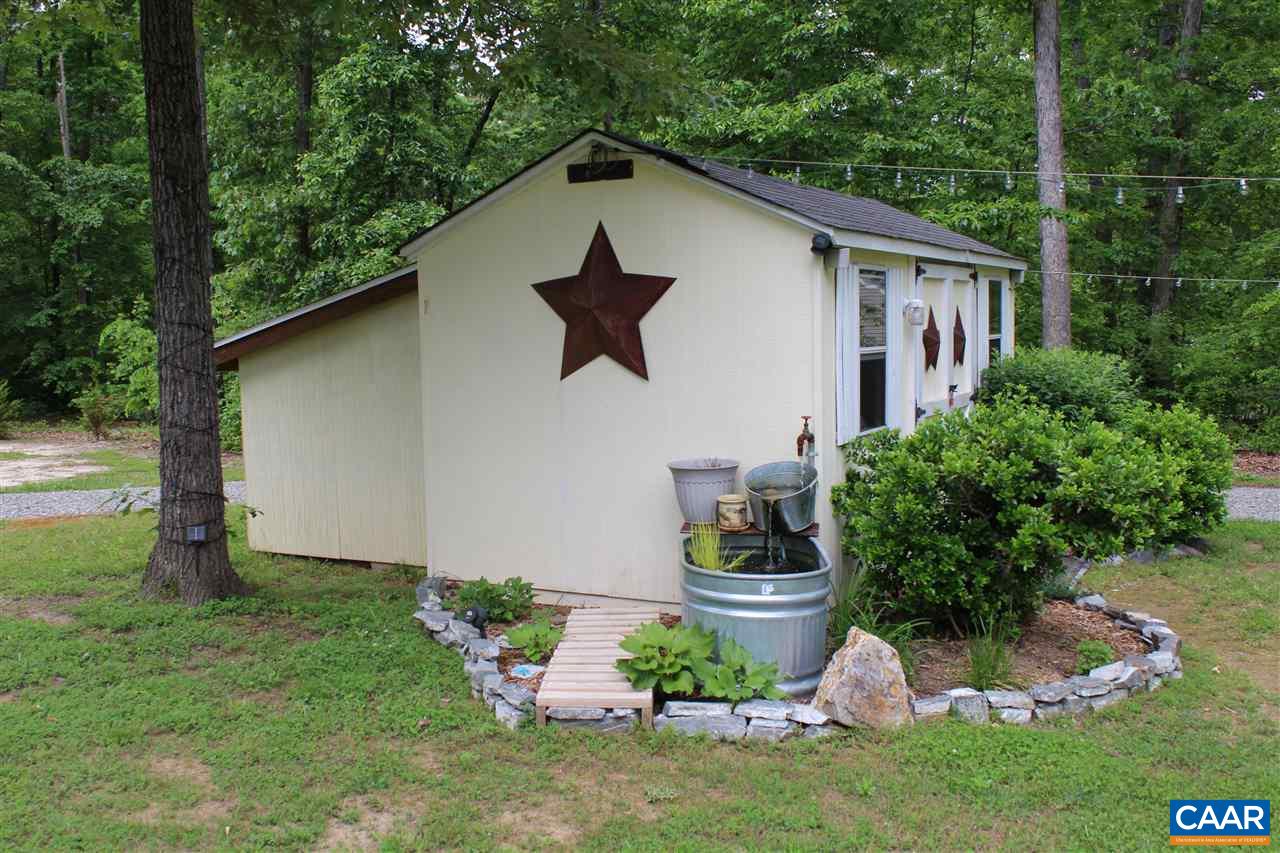 431 Buckner Road Bumpass, VA 23024 - Photo 23 of 34 a house view with a garden space