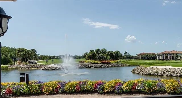 a view of a lake with a city