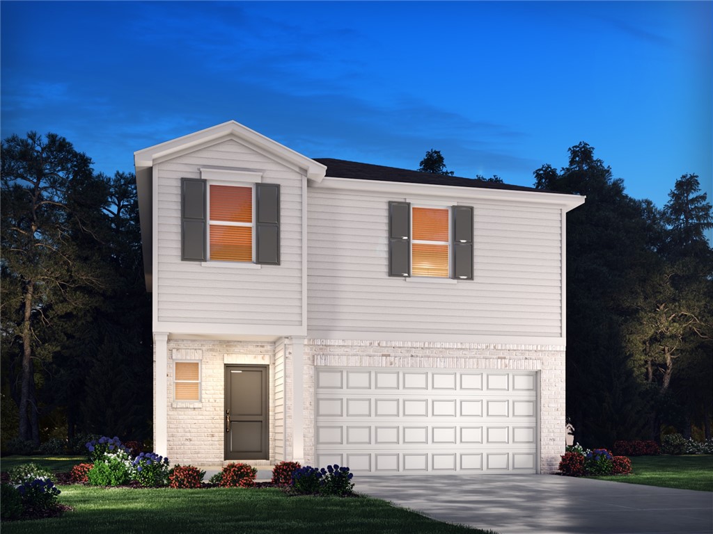 961 Penfold Pointe Wellford, SC 29385 - Photo 1 of 31 This charming home features a classic design with an inviting exterior and lush landscaping.
