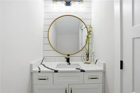 a sink with a mirror