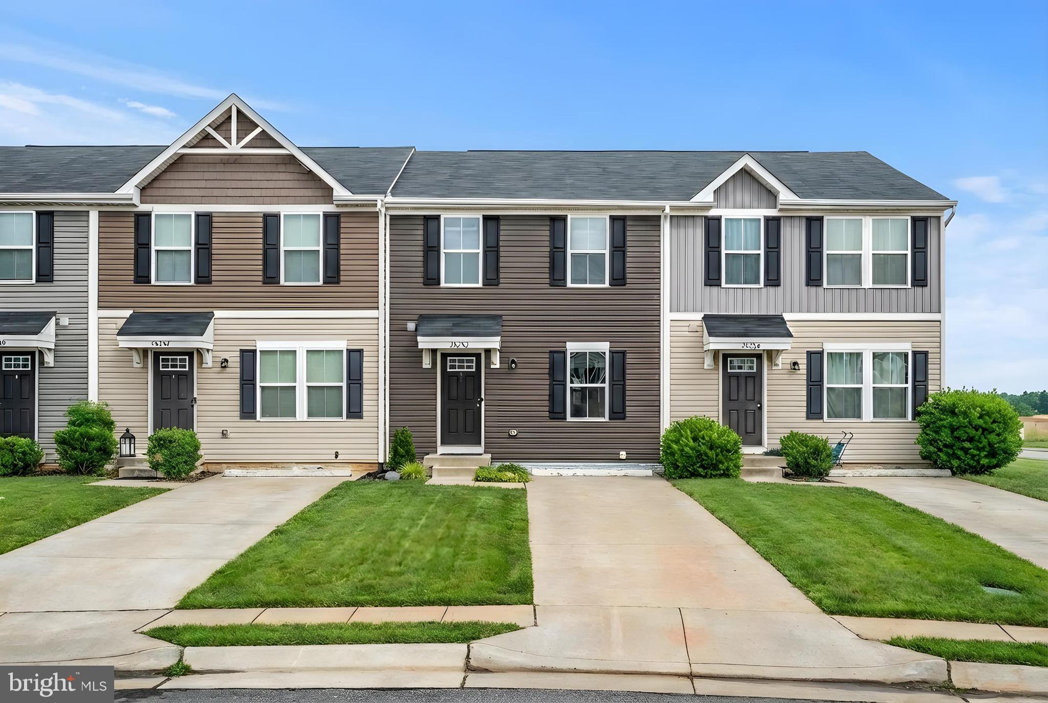 35252 Sara Court Locust Grove, VA 22508 - Photo 1 of 40 a front view of a house with a yard