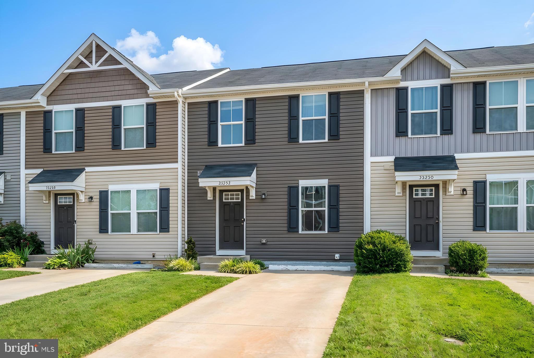 35252 Sara Court Locust Grove, VA 22508 - Photo 2 of 40 a front view of a house with a yard