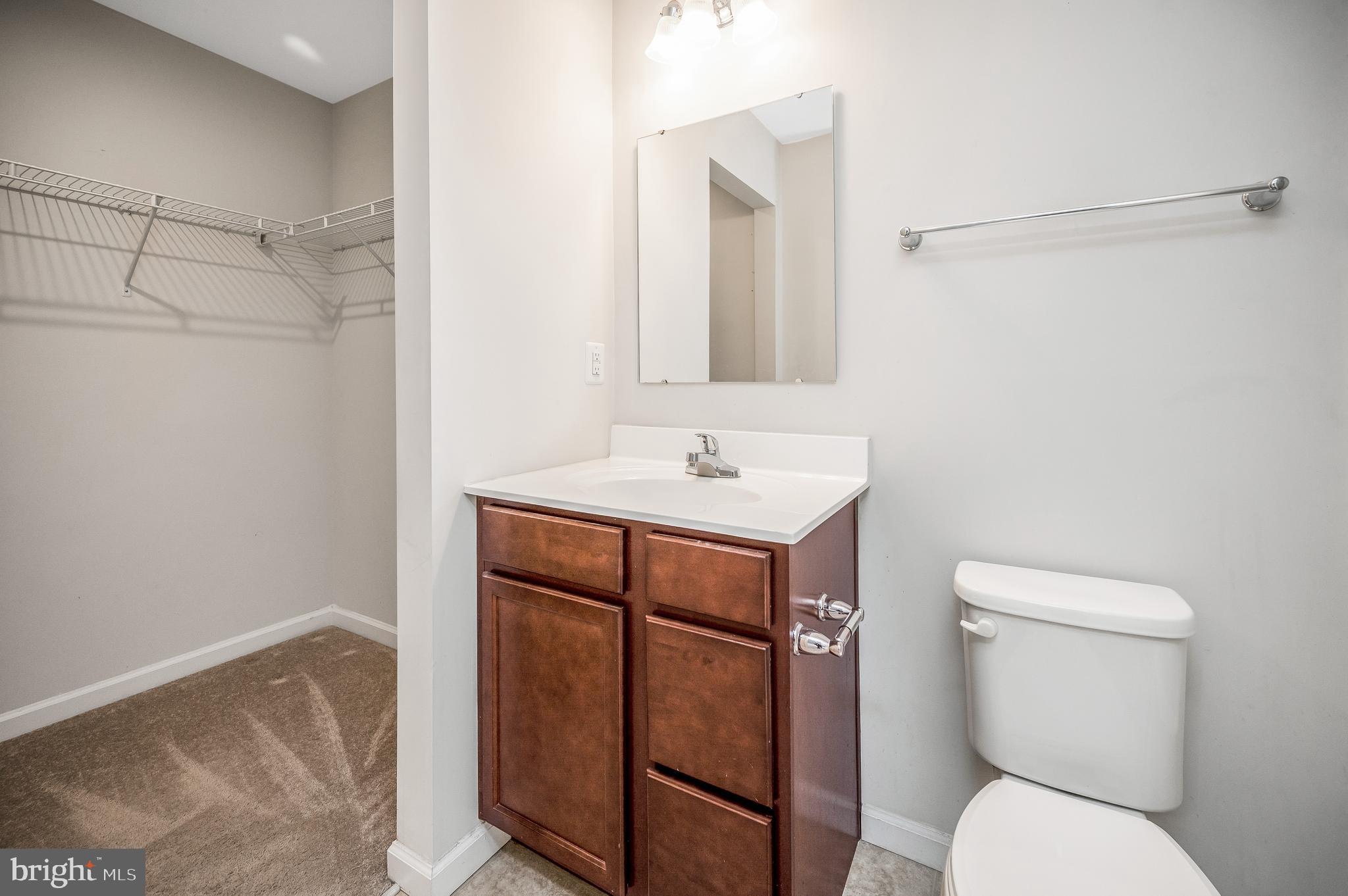 35252 Sara Court Locust Grove, VA 22508 - Photo 21 of 40 a bathroom with a toilet sink and shower