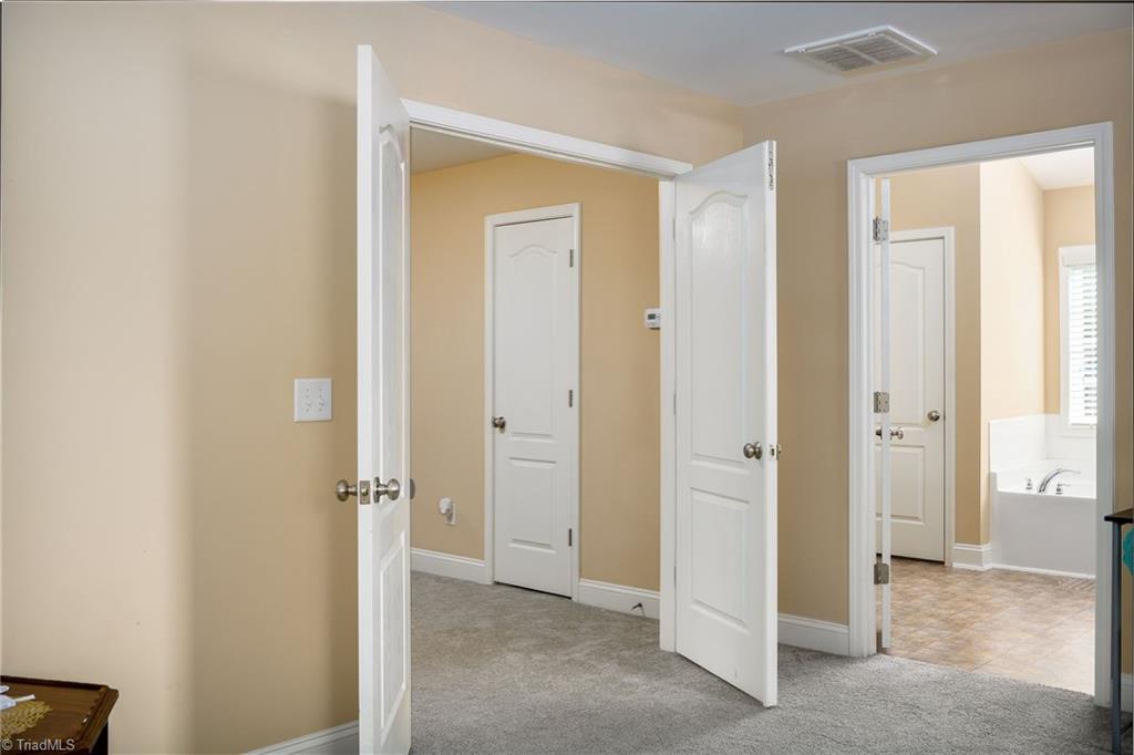 991 Beesons Field Drive Kernersville, NC 27284 - Photo 17 of 36 Double doors leading to the primary bedroom