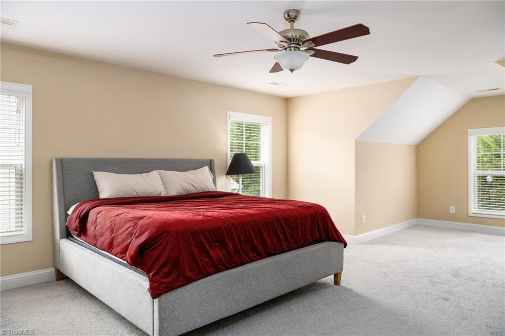 991 Beesons Field Drive Kernersville, NC 27284 - Photo 18 of 36 Primary bedroom with very nice sitting area in the background
