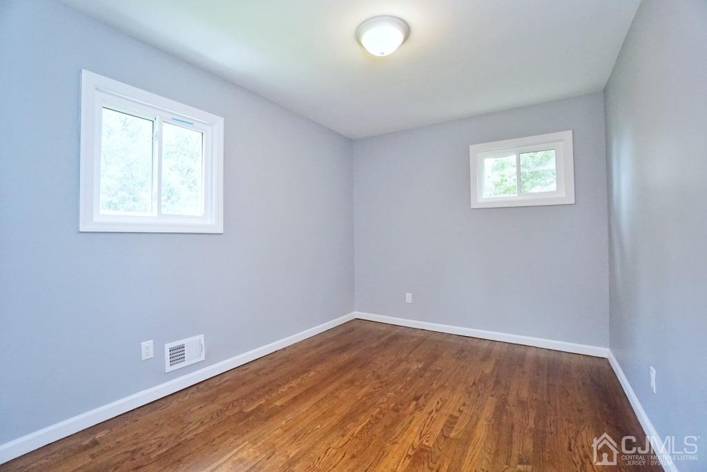 50 Dock Road Matawan, NJ 07747 - Photo 19 of 37 an empty room with a window