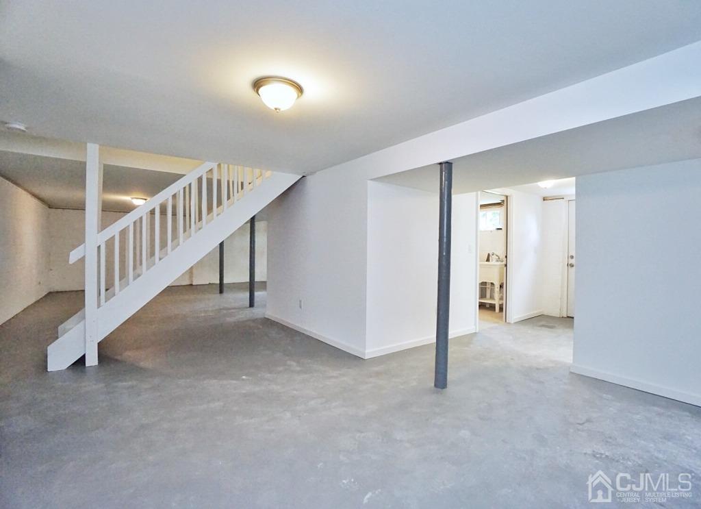 50 Dock Road Matawan, NJ 07747 - Photo 24 of 37 a view of a hallway with staircase