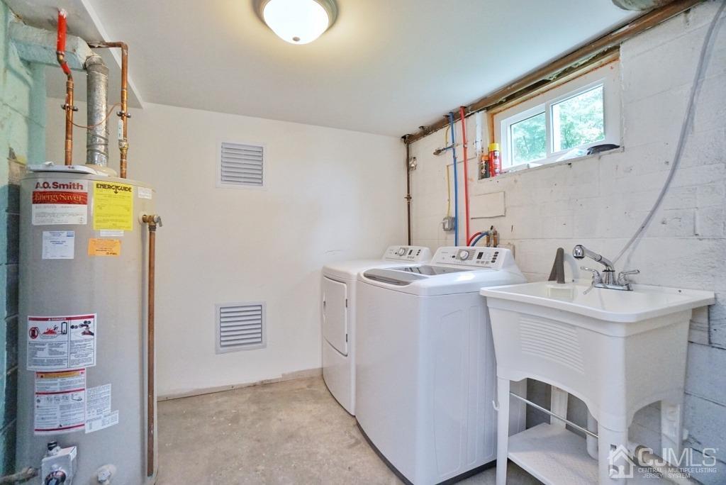 50 Dock Road Matawan, NJ 07747 - Photo 25 of 37 a bathroom with double vanity and a sink