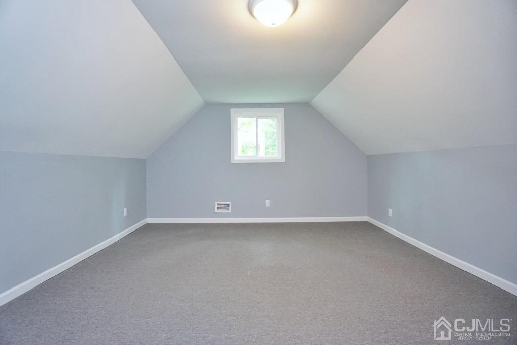50 Dock Road Matawan, NJ 07747 - Photo 27 of 37 an empty room with a empty space and windows