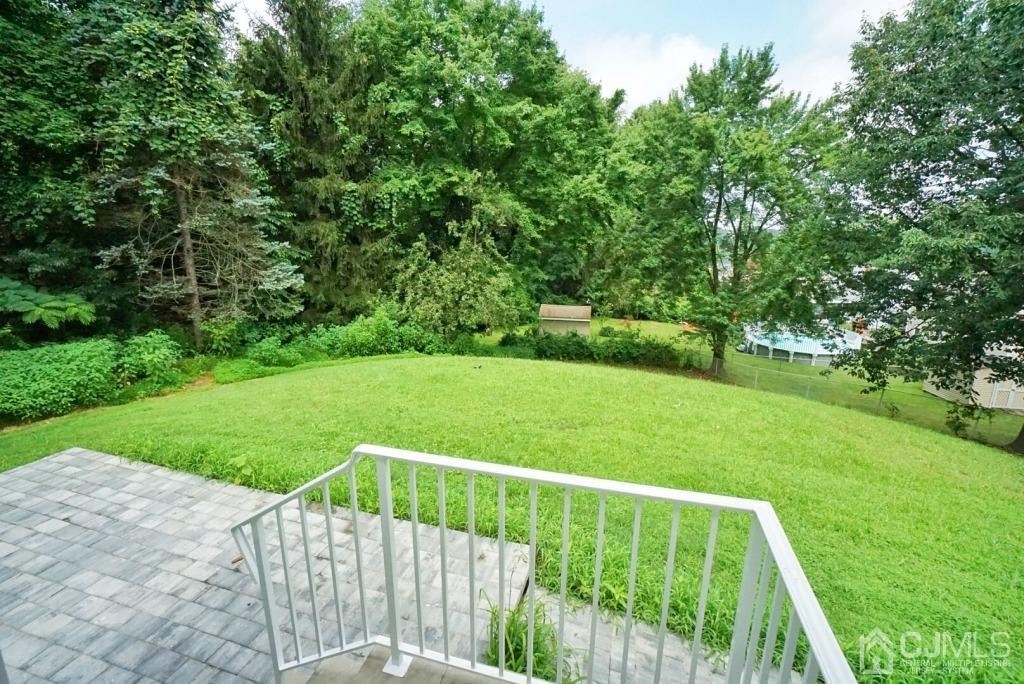 50 Dock Road Matawan, NJ 07747 - Photo 32 of 37 a view of a deck with a yard