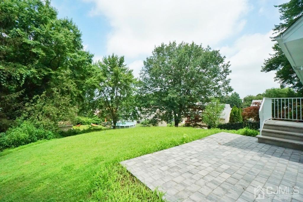 50 Dock Road Matawan, NJ 07747 - Photo 33 of 37 a view of a backyard with green space