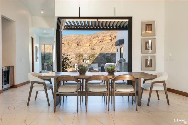 3607 South Cypress Pt Road Hurricane, UT 84737 - Photo 27 of 59 Dining room with a mountain view and entrance out to the pool.