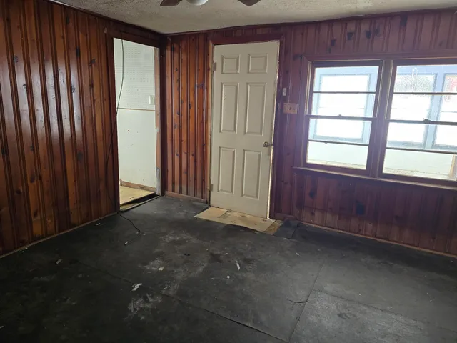 an empty room with windows