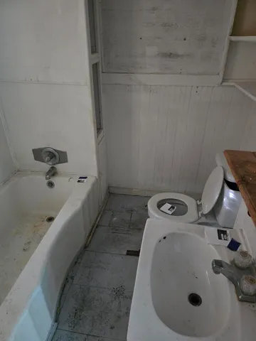 a bathroom with a sink and bathtub
