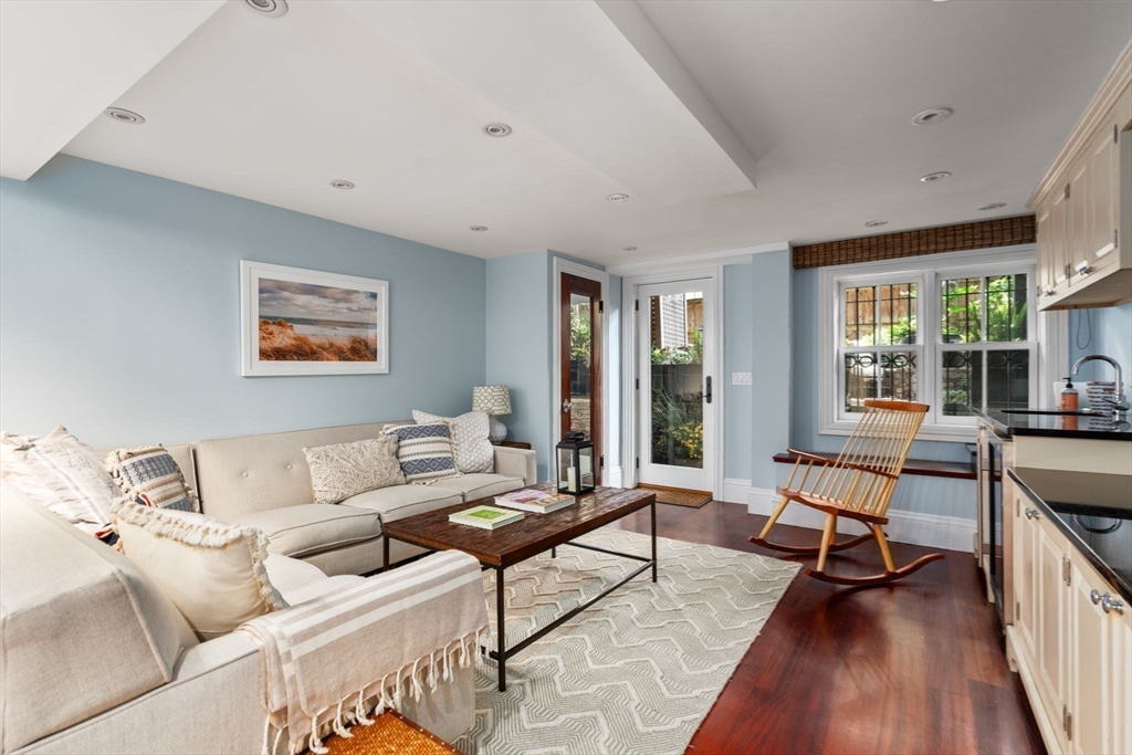 32 Rutland Square, Unit 1 Boston, MA 02118 - Photo 15 of 24 a living room with furniture and a wooden floor