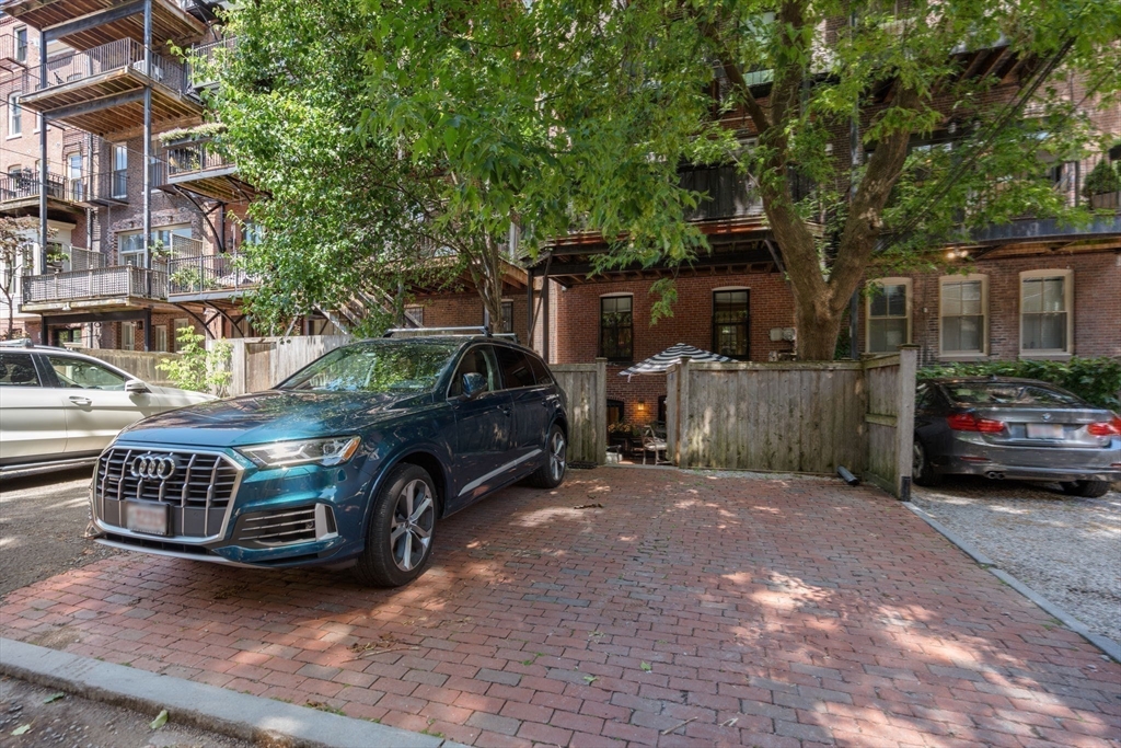 32 Rutland Square, Unit 1 Boston, MA 02118 - Photo 21 of 24 a car parked in front of a house