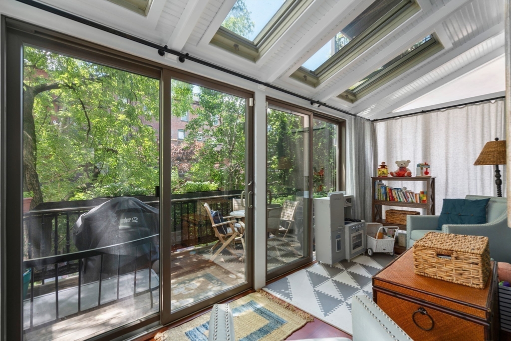 32 Rutland Square, Unit 1 Boston, MA 02118 - Photo 5 of 24 a living room with furniture tv and a window