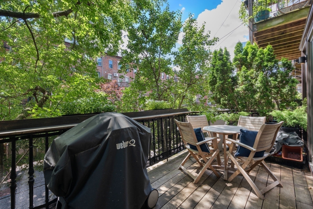 32 Rutland Square, Unit 1 Boston, MA 02118 - Photo 6 of 24 a view of deck with furniture and trees
