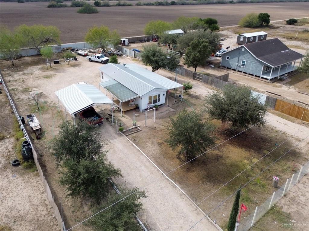 39817 Mile 4 Road Penitas, TX 78576 - Photo 2 of 19 an aerial view of a house with a yard